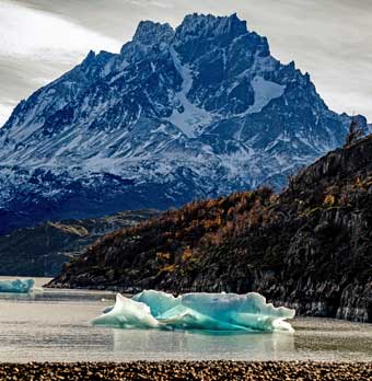 Pategonia-grey glacier-lake ice with mountain background