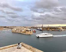 Valletta Harbor entrance with ferry