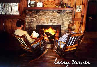 Oregon cabin, reading by the fireplace