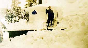 Oregon cabin roof, removing snow